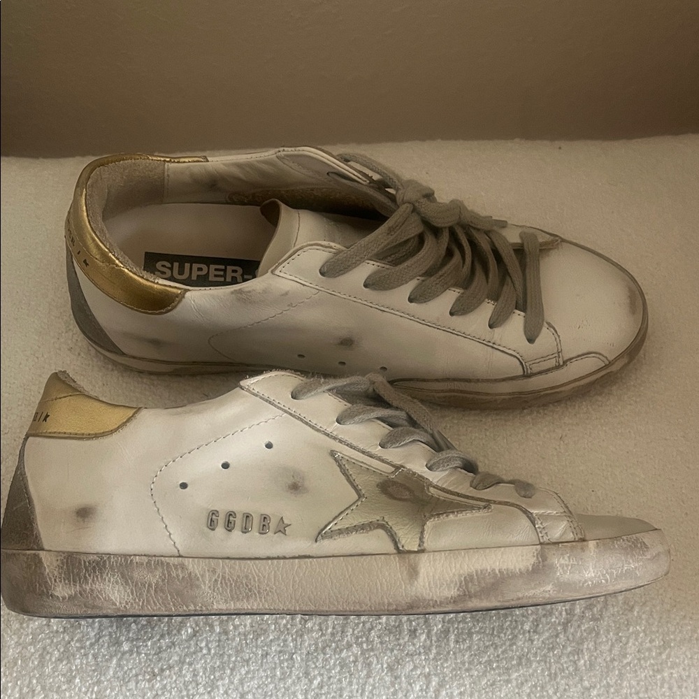 Golden Goose Superstar White Sneakers with Gold Details